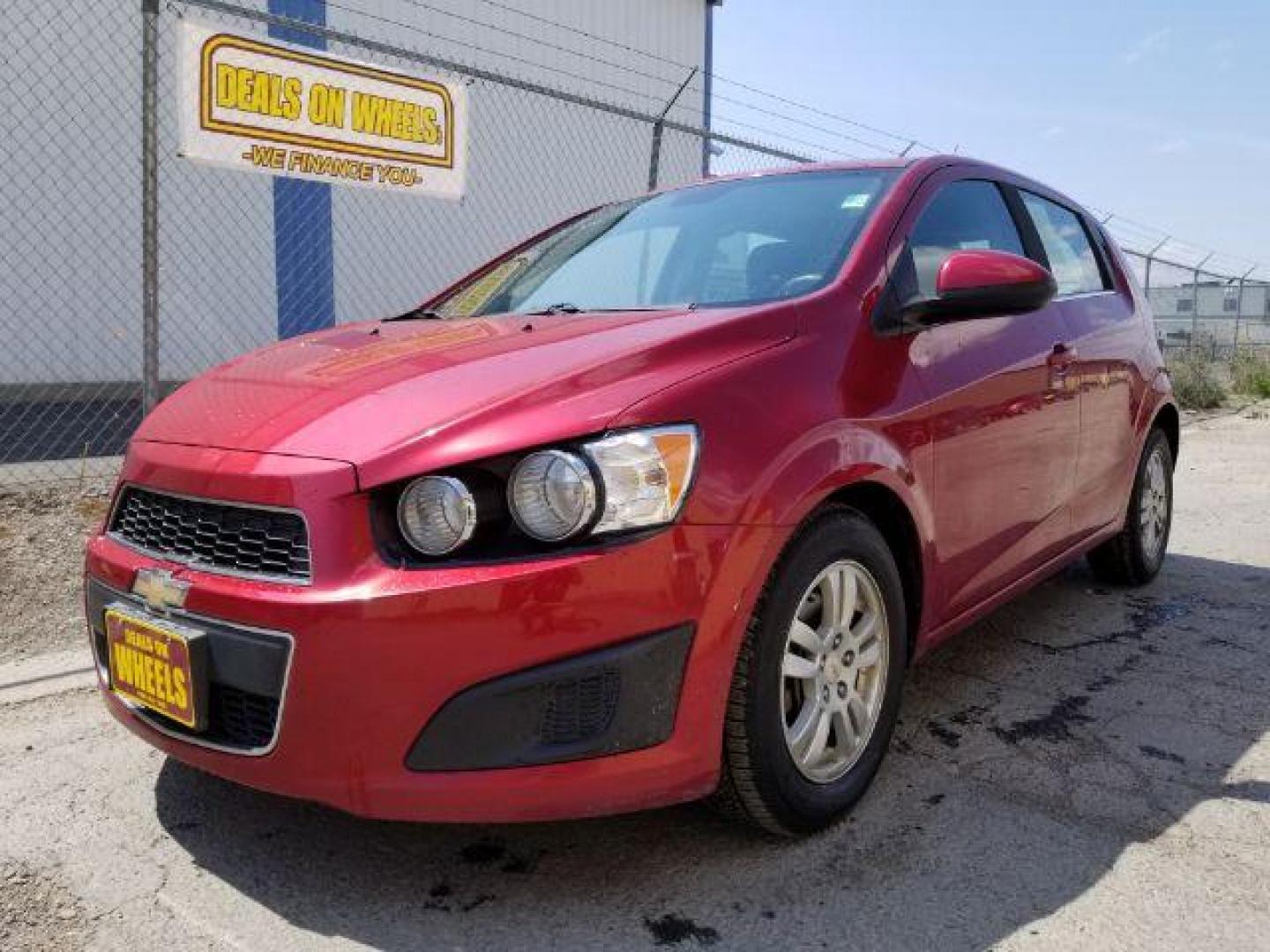 2012 Chevrolet Sonic 2LT 5-Door (1G1JC6SH6C4) with an 1.8L L4 DOHC 24V engine, 6-Speed Automatic transmission, located at 4801 10th Ave S,, Great Falls, MT, 59405, 47.494347, -111.229942 - Photo#0