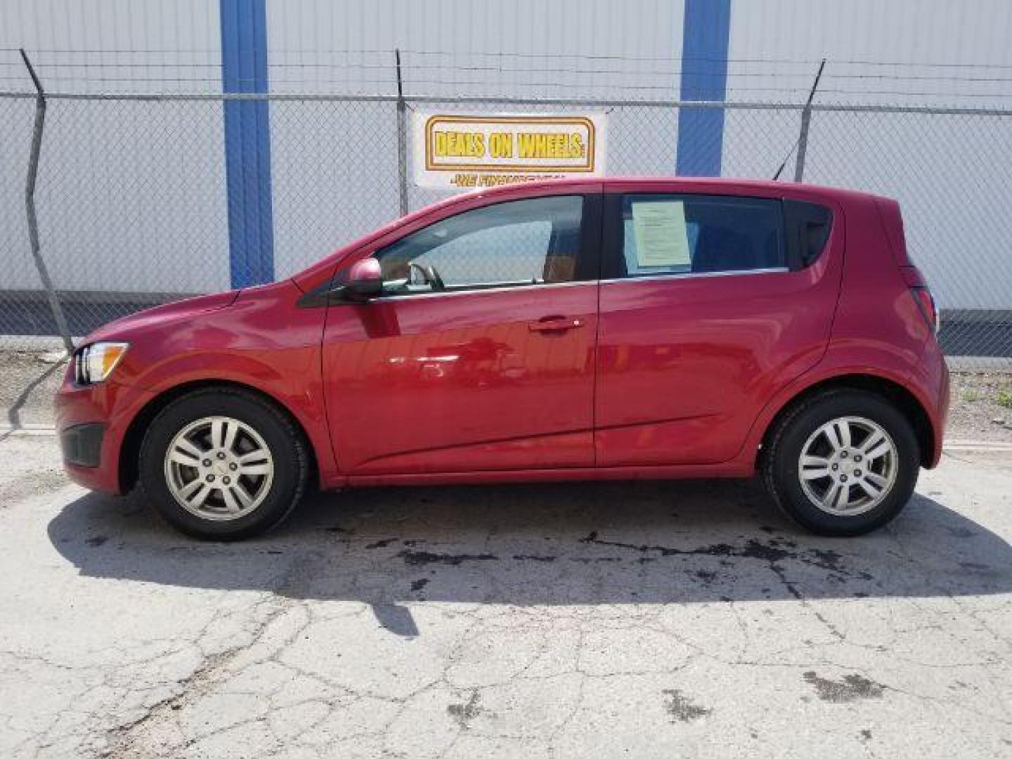 2012 Chevrolet Sonic 2LT 5-Door (1G1JC6SH6C4) with an 1.8L L4 DOHC 24V engine, 6-Speed Automatic transmission, located at 4801 10th Ave S,, Great Falls, MT, 59405, 47.494347, -111.229942 - Photo#2