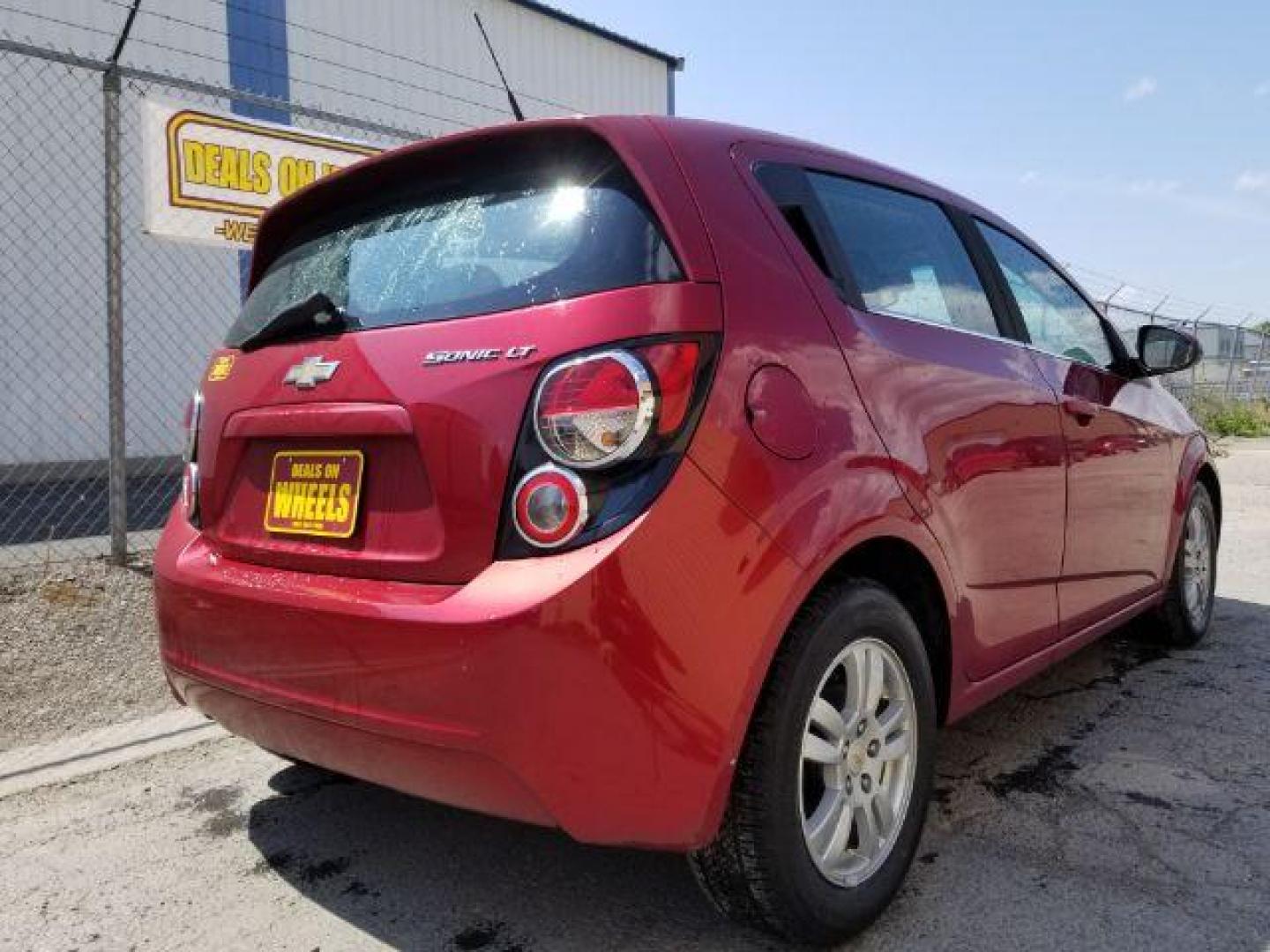 2012 Chevrolet Sonic 2LT 5-Door (1G1JC6SH6C4) with an 1.8L L4 DOHC 24V engine, 6-Speed Automatic transmission, located at 4801 10th Ave S,, Great Falls, MT, 59405, 47.494347, -111.229942 - Photo#4