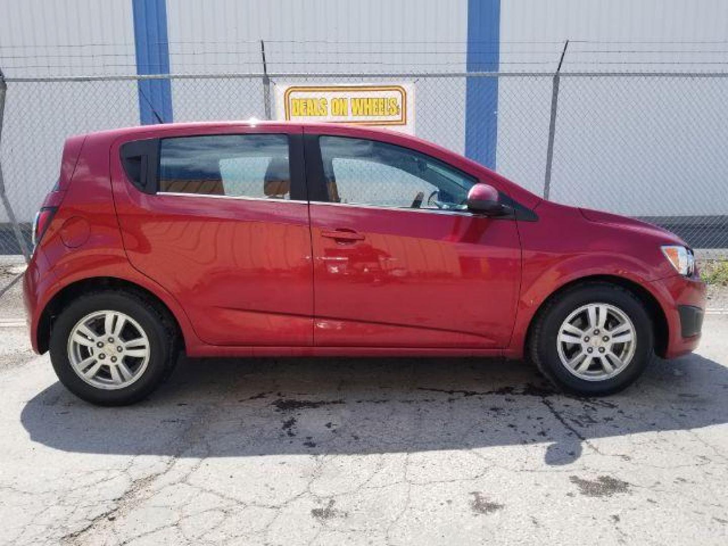 2012 Chevrolet Sonic 2LT 5-Door (1G1JC6SH6C4) with an 1.8L L4 DOHC 24V engine, 6-Speed Automatic transmission, located at 4801 10th Ave S,, Great Falls, MT, 59405, 47.494347, -111.229942 - Photo#5