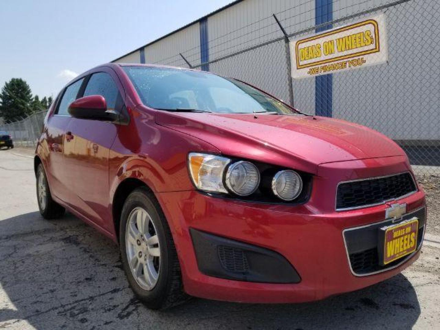 2012 Chevrolet Sonic 2LT 5-Door (1G1JC6SH6C4) with an 1.8L L4 DOHC 24V engine, 6-Speed Automatic transmission, located at 4801 10th Ave S,, Great Falls, MT, 59405, 47.494347, -111.229942 - Photo#6