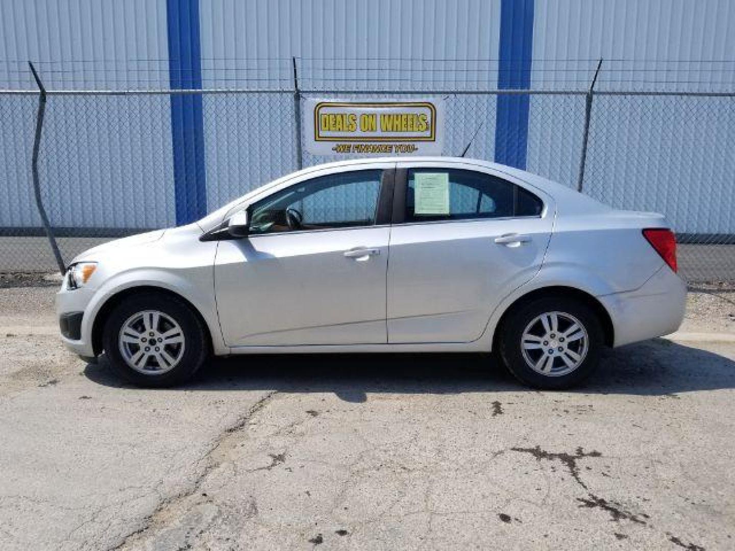 2012 Chevrolet Sonic 2LT Sedan (1G1JC5SH6C4) with an 1.8L L4 DOHC 24V engine, 6-Speed Automatic transmission, located at 601 E. Idaho St., Kalispell, MT, 59901, 48.203983, -114.308662 - Photo#2