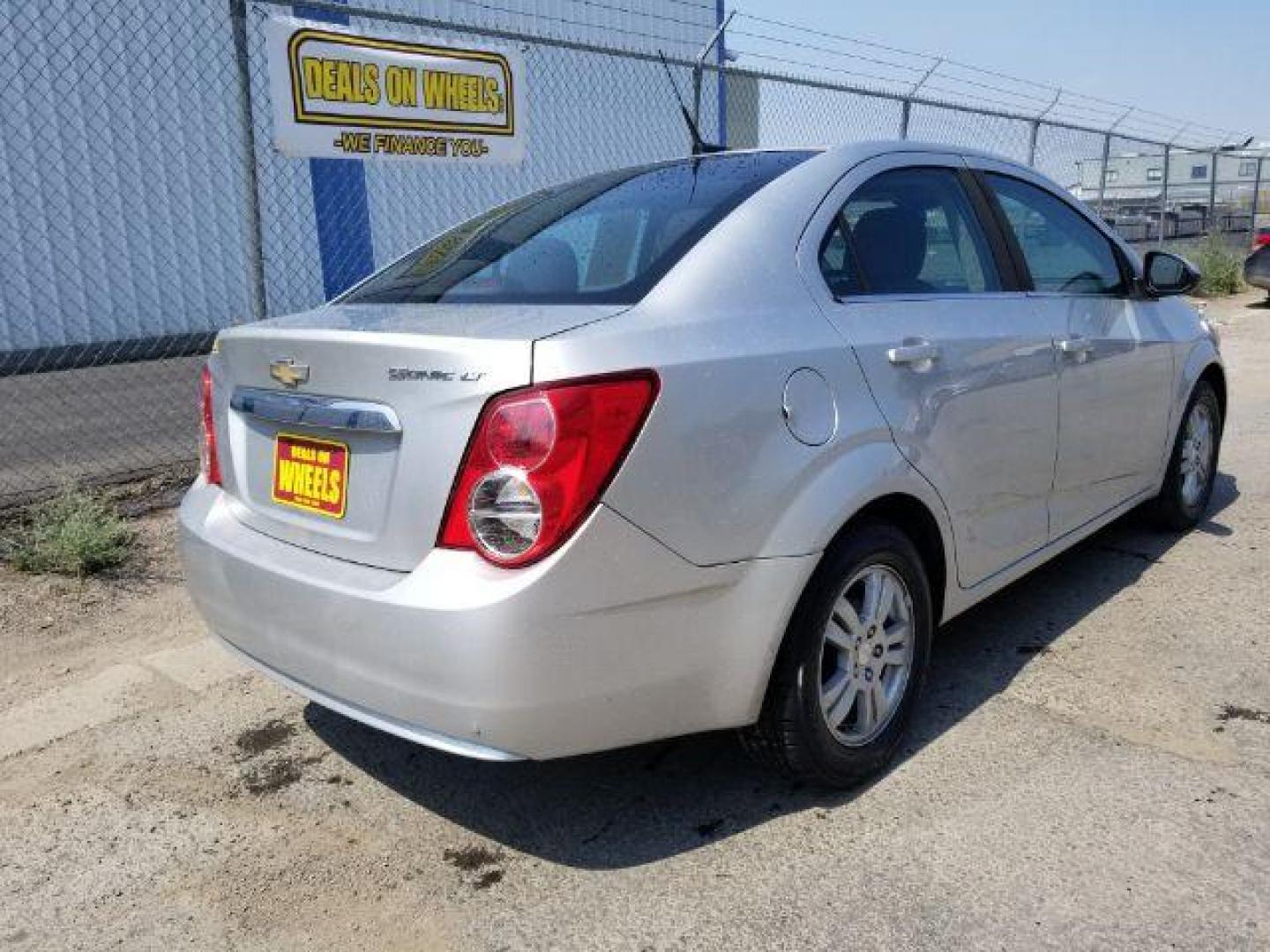 2012 Chevrolet Sonic 2LT Sedan (1G1JC5SH6C4) with an 1.8L L4 DOHC 24V engine, 6-Speed Automatic transmission, located at 601 E. Idaho St., Kalispell, MT, 59901, 48.203983, -114.308662 - Photo#4