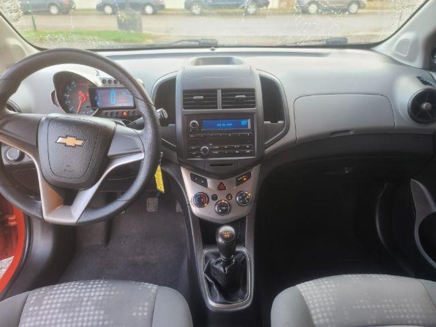 2012 Chevrolet Sonic 1LS 5-Door (1G1JB6SH8C4) with an 1.8L L4 DOHC 24V engine, 5-Speed Manual transmission, located at 1800 West Broadway, Missoula, 59808, (406) 543-1986, 46.881348, -114.023628 - Photo#7