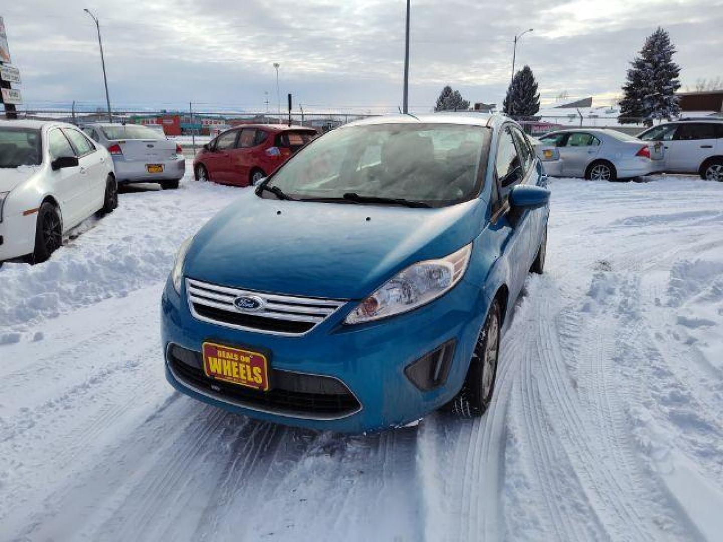 2012 Ford Fiesta SE Sedan (3FADP4BJ6CM) with an 1.6L L4 DOHC 16V engine, located at 4801 10th Ave S,, Great Falls, MT, 59405, 47.494347, -111.229942 - Photo#0