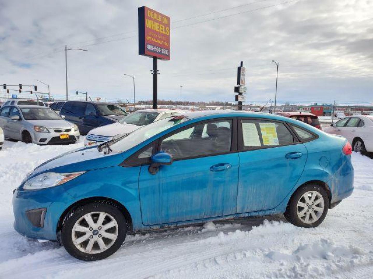 2012 Ford Fiesta SE Sedan (3FADP4BJ6CM) with an 1.6L L4 DOHC 16V engine, located at 4801 10th Ave S,, Great Falls, MT, 59405, 47.494347, -111.229942 - Photo#1