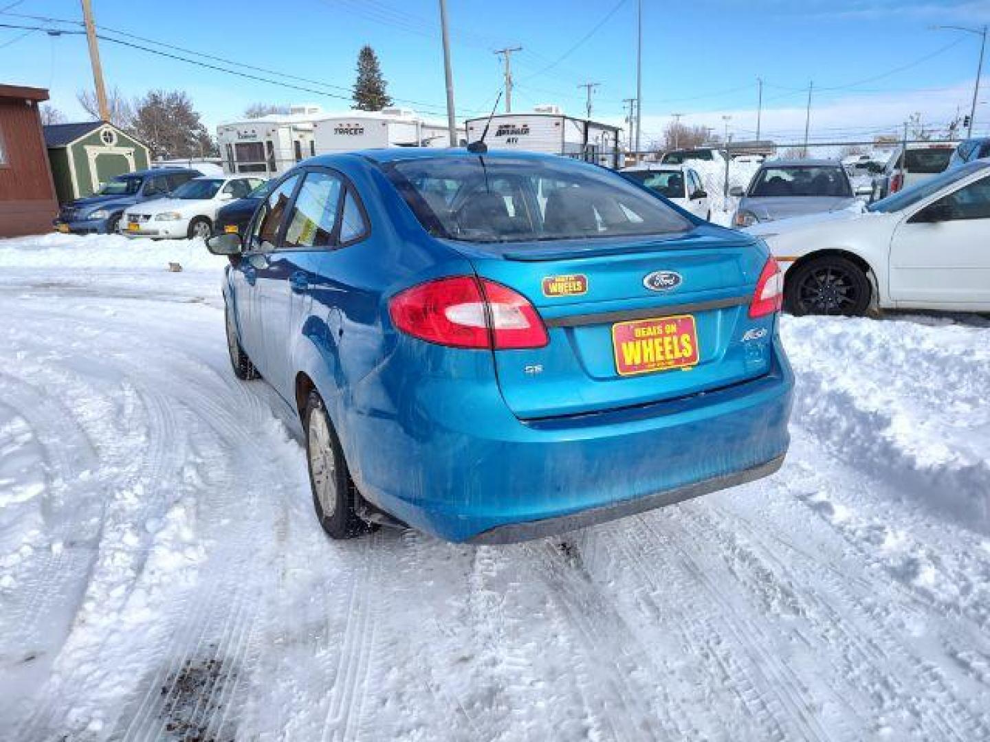 2012 Ford Fiesta SE Sedan (3FADP4BJ6CM) with an 1.6L L4 DOHC 16V engine, located at 4801 10th Ave S,, Great Falls, MT, 59405, 47.494347, -111.229942 - Photo#2