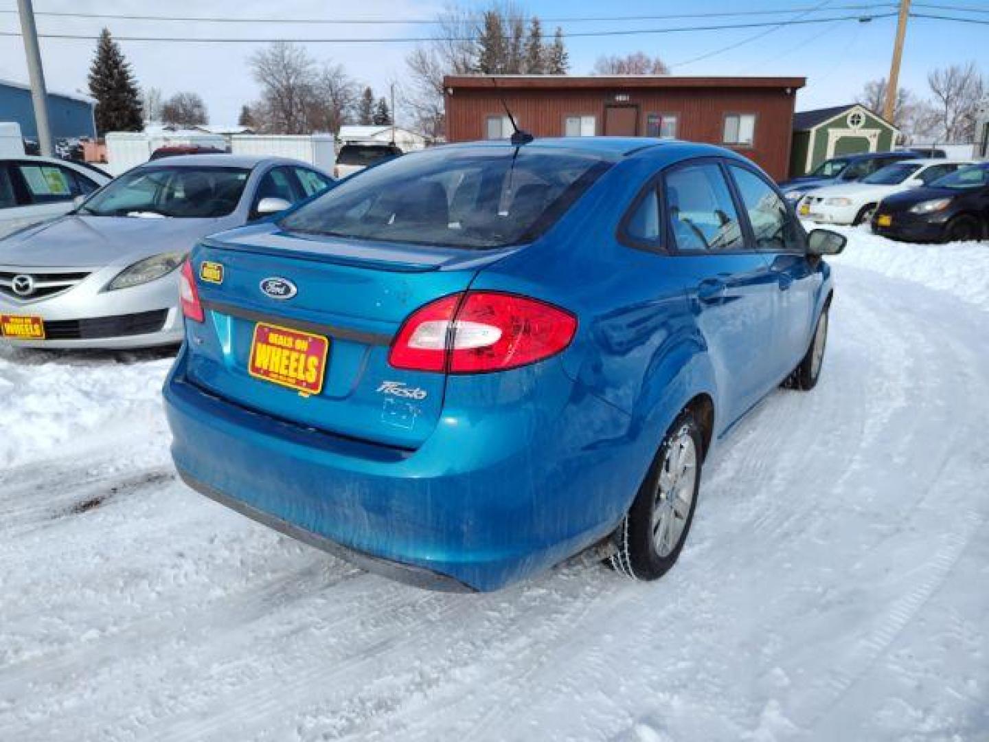 2012 Ford Fiesta SE Sedan (3FADP4BJ6CM) with an 1.6L L4 DOHC 16V engine, located at 4801 10th Ave S,, Great Falls, MT, 59405, 47.494347, -111.229942 - Photo#4