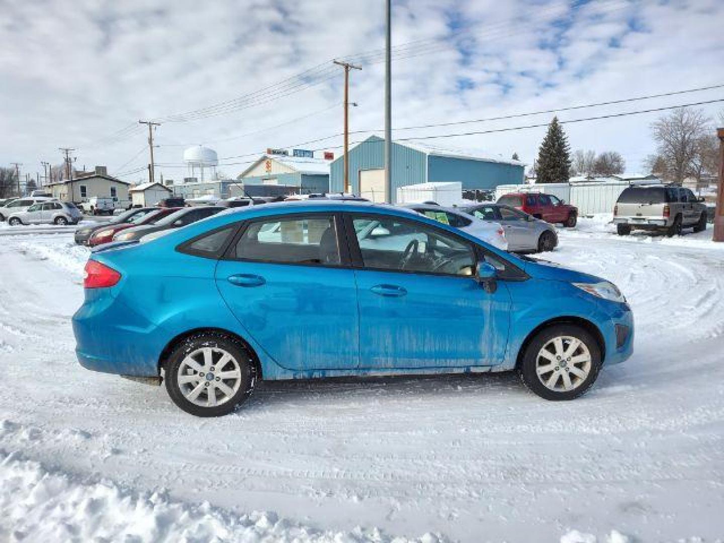 2012 Ford Fiesta SE Sedan (3FADP4BJ6CM) with an 1.6L L4 DOHC 16V engine, located at 4801 10th Ave S,, Great Falls, MT, 59405, 47.494347, -111.229942 - Photo#5