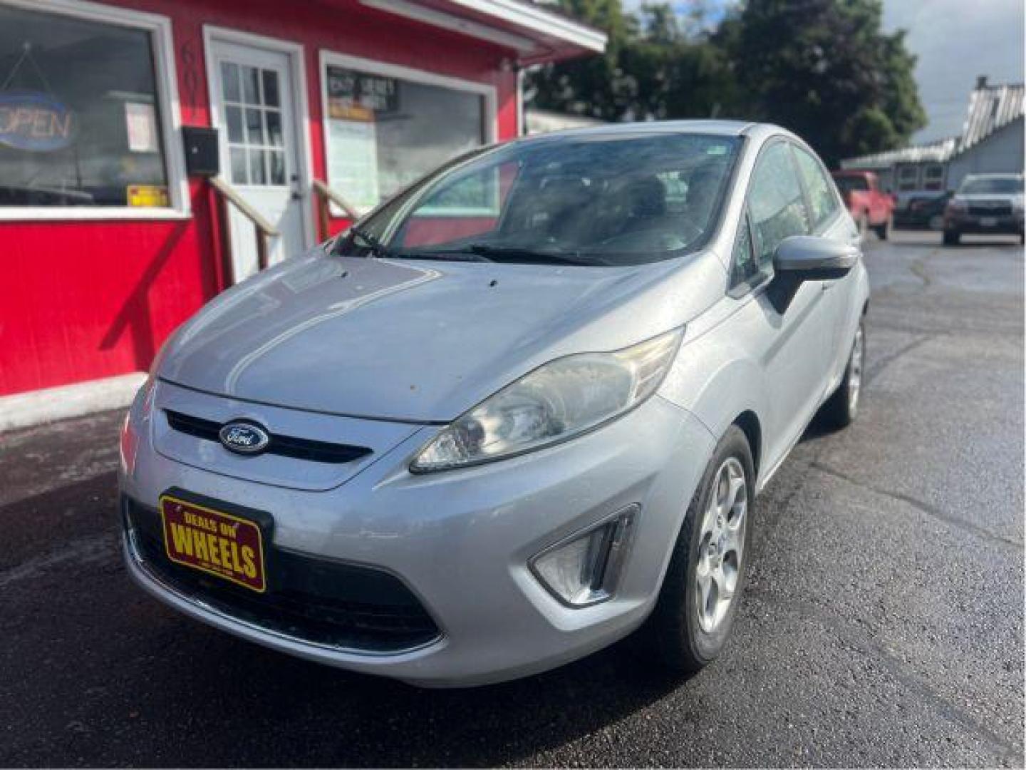 2012 Ford Fiesta SES Hatchback (3FADP4FJ5CM) with an 1.6L L4 DOHC 16V engine, located at 601 E. Idaho St., Kalispell, MT, 59901, 48.203983, -114.308662 - Photo#0