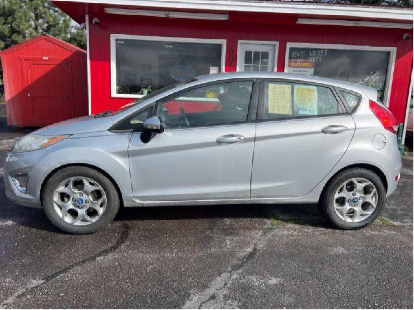 2012 Ford Fiesta SES Hatchback (3FADP4FJ5CM) with an 1.6L L4 DOHC 16V engine, located at 601 E. Idaho St., Kalispell, MT, 59901, 48.203983, -114.308662 - Photo#1