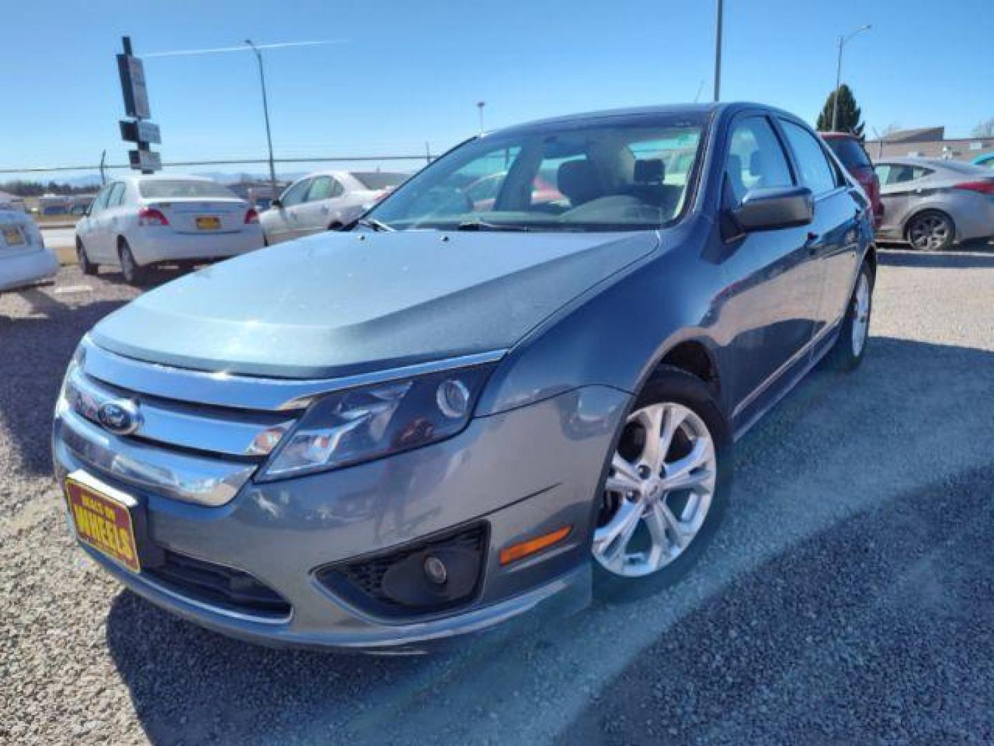 2012 Ford Fusion SE (3FAHP0HA0CR) with an 2.5L L4 DOHC 16V engine, located at 4801 10th Ave S,, Great Falls, MT, 59405, 47.494347, -111.229942 - Photo#0