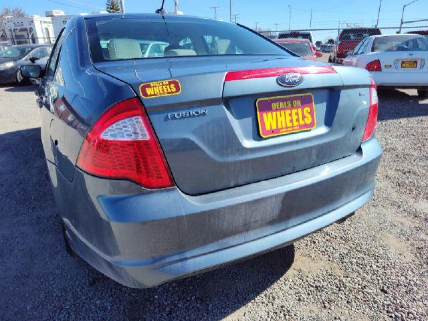 2012 Ford Fusion SE (3FAHP0HA0CR) with an 2.5L L4 DOHC 16V engine, located at 4801 10th Ave S,, Great Falls, MT, 59405, 47.494347, -111.229942 - Photo#2