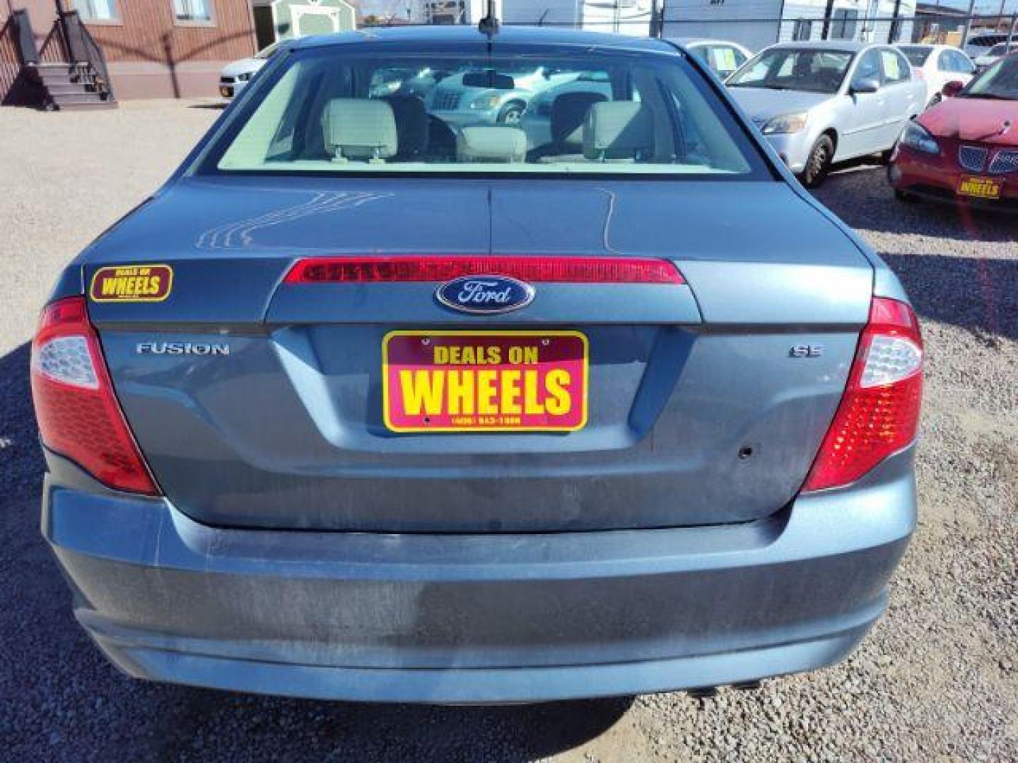 2012 Ford Fusion SE (3FAHP0HA0CR) with an 2.5L L4 DOHC 16V engine, located at 4801 10th Ave S,, Great Falls, MT, 59405, 47.494347, -111.229942 - Photo#3