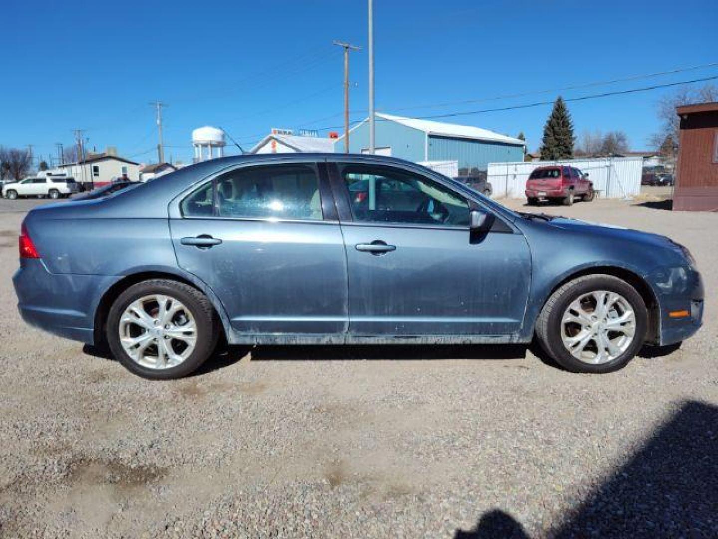 2012 Ford Fusion SE (3FAHP0HA0CR) with an 2.5L L4 DOHC 16V engine, located at 4801 10th Ave S,, Great Falls, MT, 59405, 47.494347, -111.229942 - Photo#5