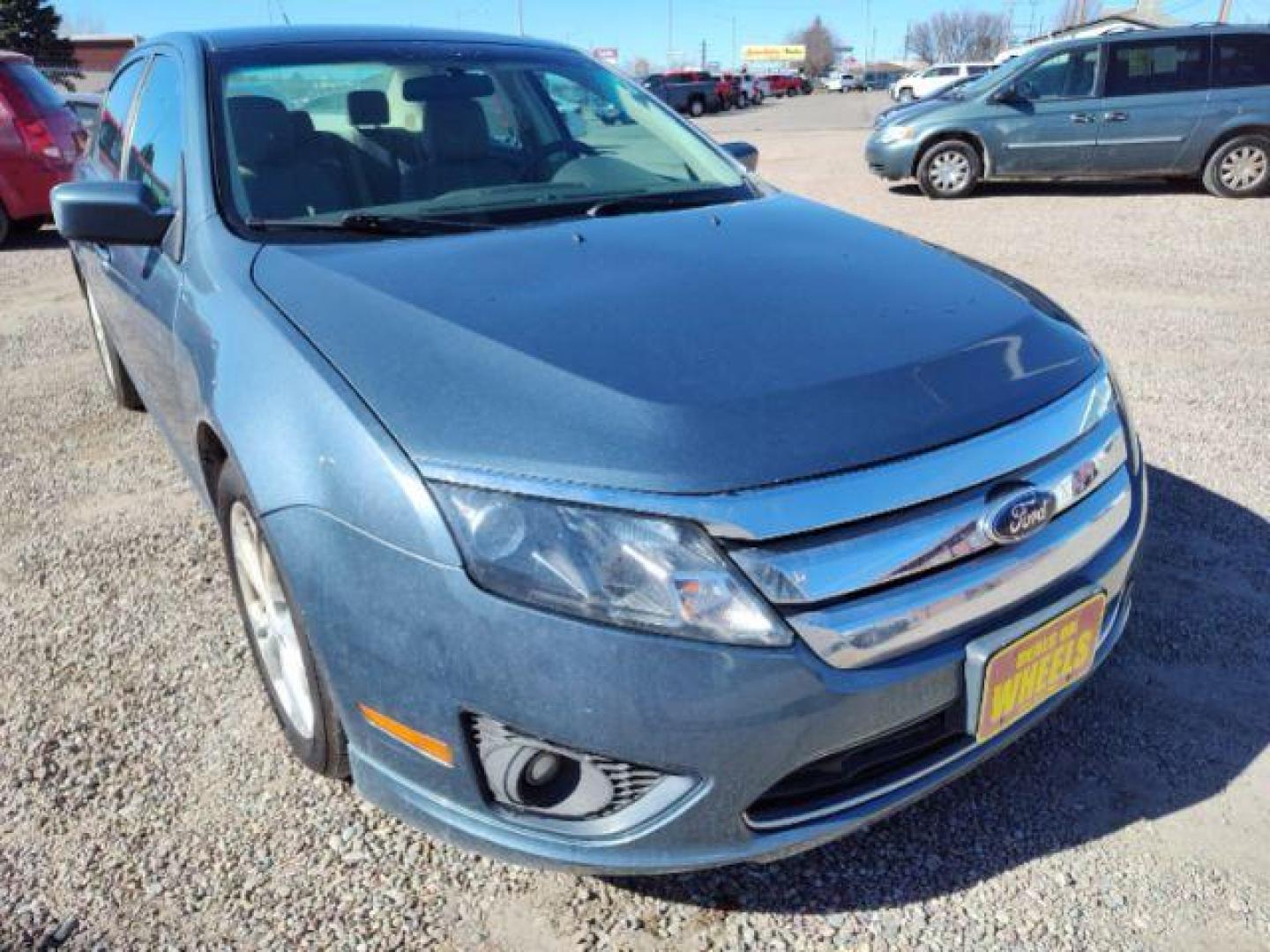 2012 Ford Fusion SE (3FAHP0HA0CR) with an 2.5L L4 DOHC 16V engine, located at 4801 10th Ave S,, Great Falls, MT, 59405, 47.494347, -111.229942 - Photo#6