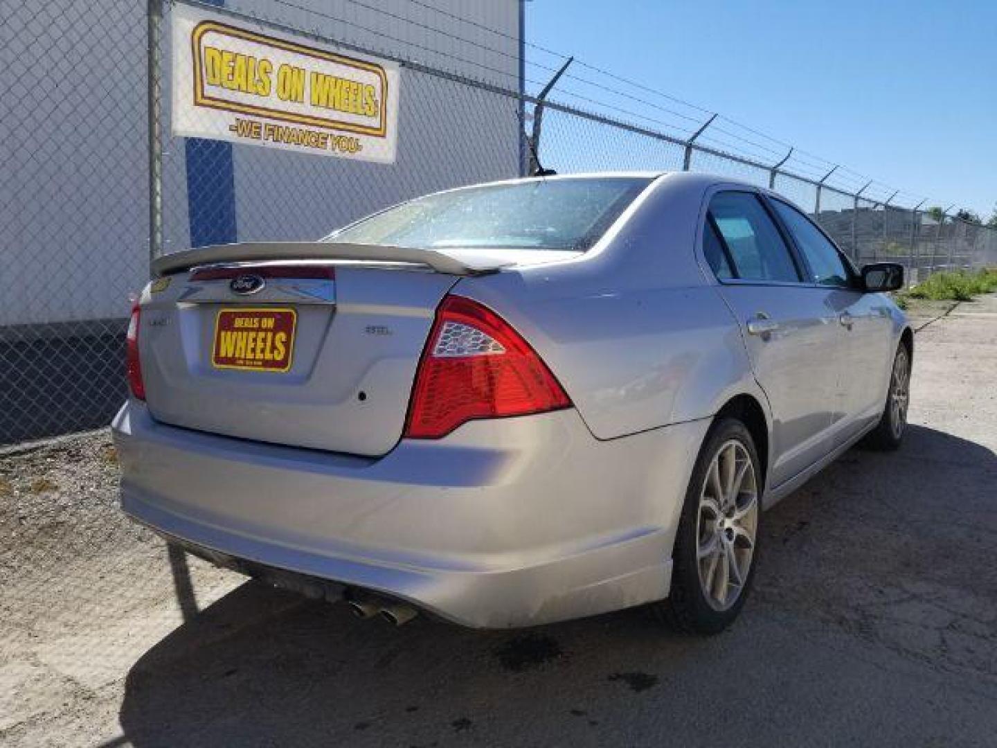 2012 Ford Fusion SEL (3FAHP0JA0CR) with an 2.5L L4 DOHC 16V engine, located at 1821 N Montana Ave., Helena, MT, 59601, 46.603447, -112.022781 - Photo#4