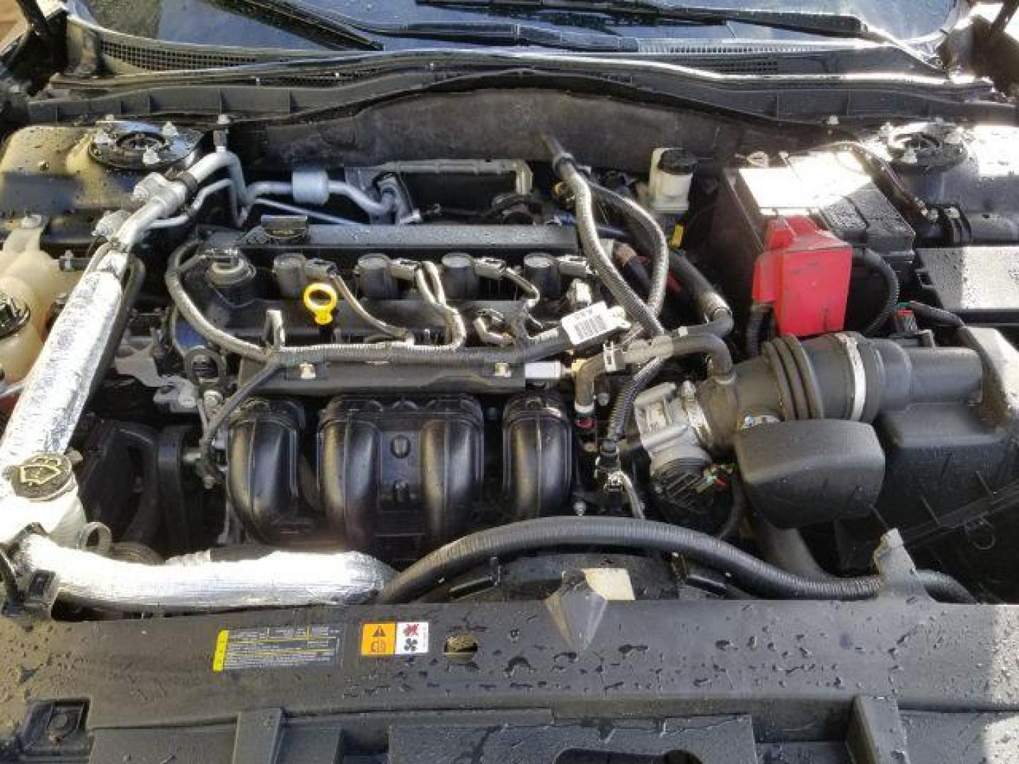 2012 Ford Fusion SE (3FAHP0HAXCR) with an 2.5L L4 DOHC 16V engine, located at 601 E. Idaho St., Kalispell, MT, 59901, 48.203983, -114.308662 - Photo#14