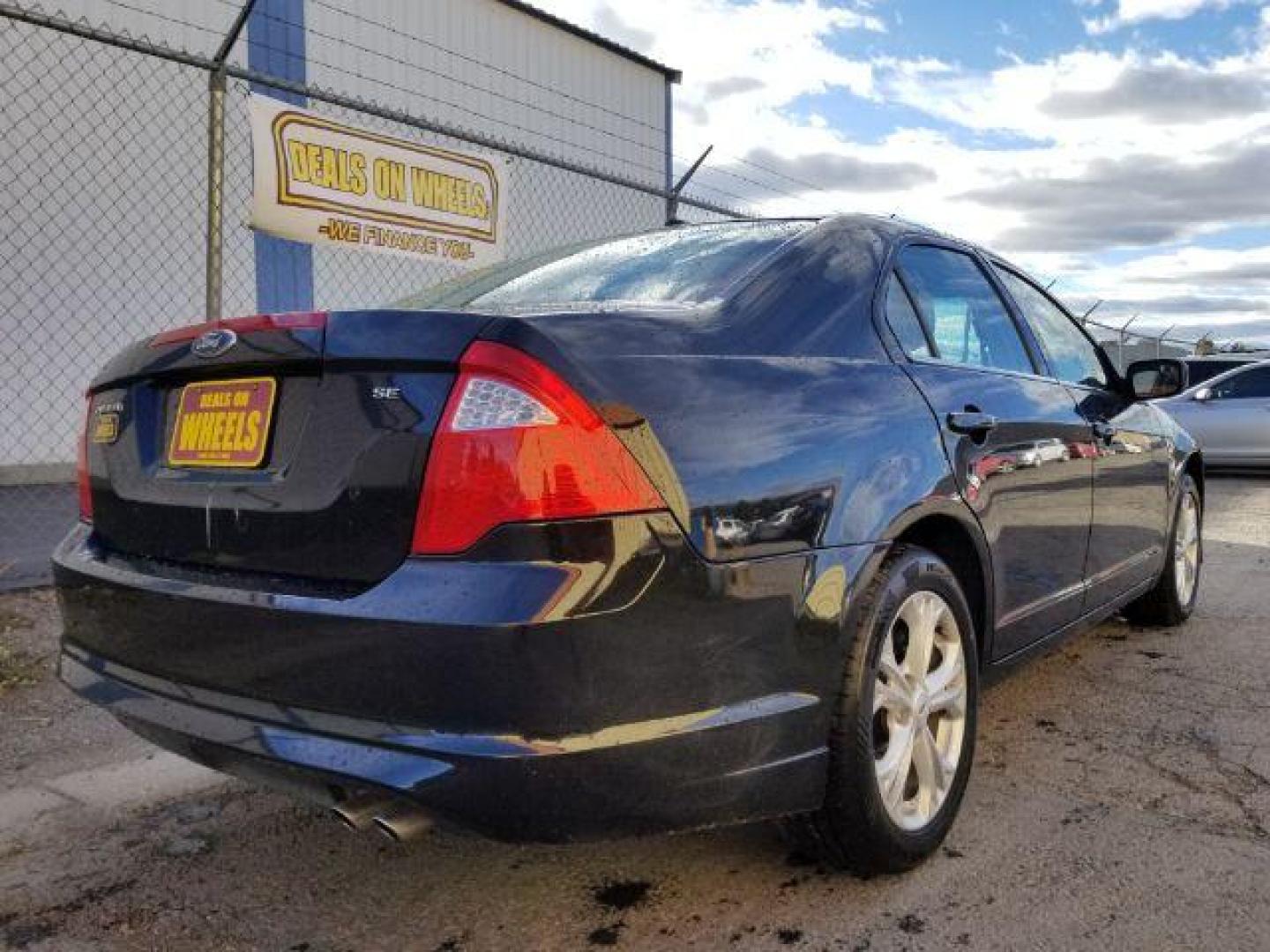 2012 Ford Fusion SE (3FAHP0HAXCR) with an 2.5L L4 DOHC 16V engine, located at 601 E. Idaho St., Kalispell, MT, 59901, 48.203983, -114.308662 - Photo#4