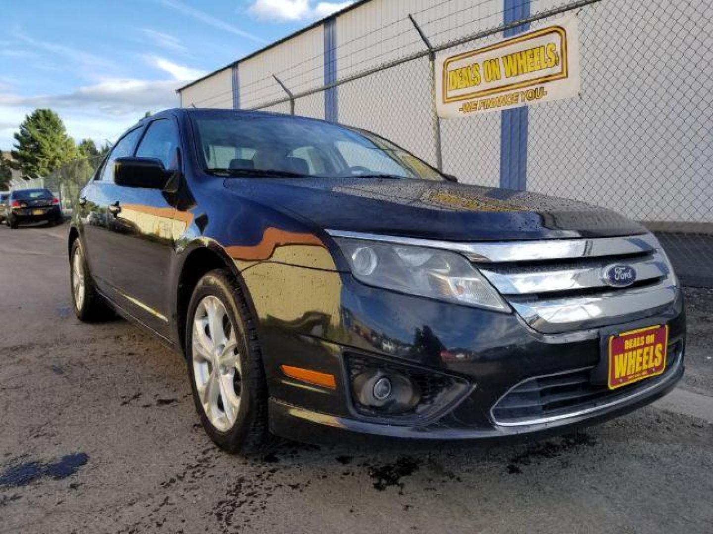 2012 Ford Fusion SE (3FAHP0HAXCR) with an 2.5L L4 DOHC 16V engine, located at 601 E. Idaho St., Kalispell, MT, 59901, 48.203983, -114.308662 - Photo#6