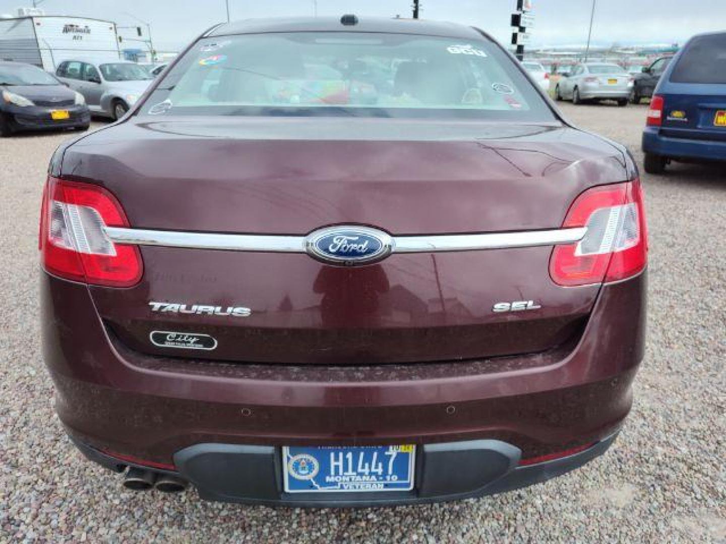 2012 Ford Taurus SEL FWD (1FAHP2EWXCG) with an 3.5L V6 DOHC 24V engine, 6-Speed Automatic transmission, located at 4801 10th Ave S,, Great Falls, MT, 59405, 47.494347, -111.229942 - Photo#4