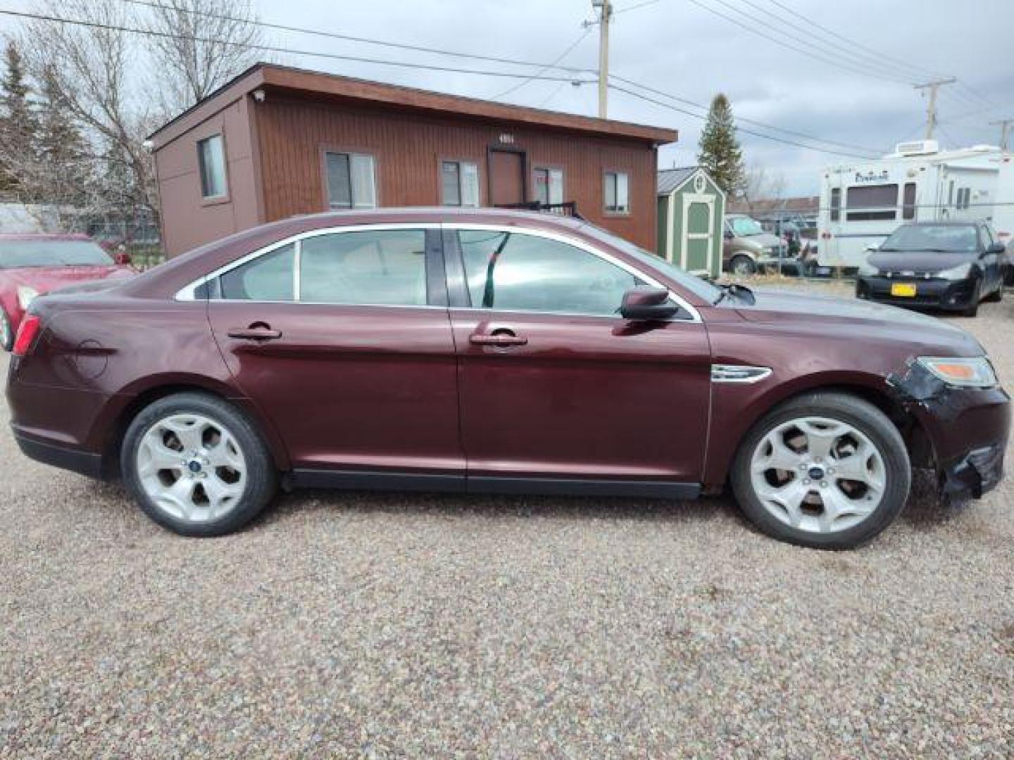 2012 Ford Taurus SEL FWD (1FAHP2EWXCG) with an 3.5L V6 DOHC 24V engine, 6-Speed Automatic transmission, located at 4801 10th Ave S,, Great Falls, MT, 59405, 47.494347, -111.229942 - Photo#6