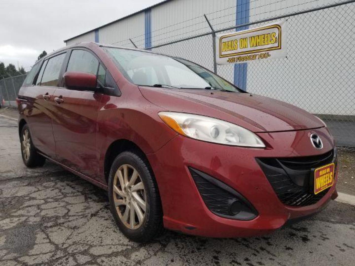 2012 Mazda MAZDA5 Sport (JM1CW2BL8C0) with an 2.5L L4 DOHC 16V engine, located at 601 E. Idaho St., Kalispell, MT, 59901, 48.203983, -114.308662 - Photo#2