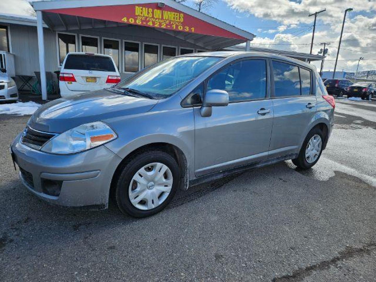 2012 Nissan Versa 1.8 SL Hatchback (3N1BC1CP3CK) with an 1.8L L4 DOHC 16V engine, Continuously Variable Transmission transmission, located at 1821 N Montana Ave., Helena, MT, 59601, 46.603447, -112.022781 - Photo#0