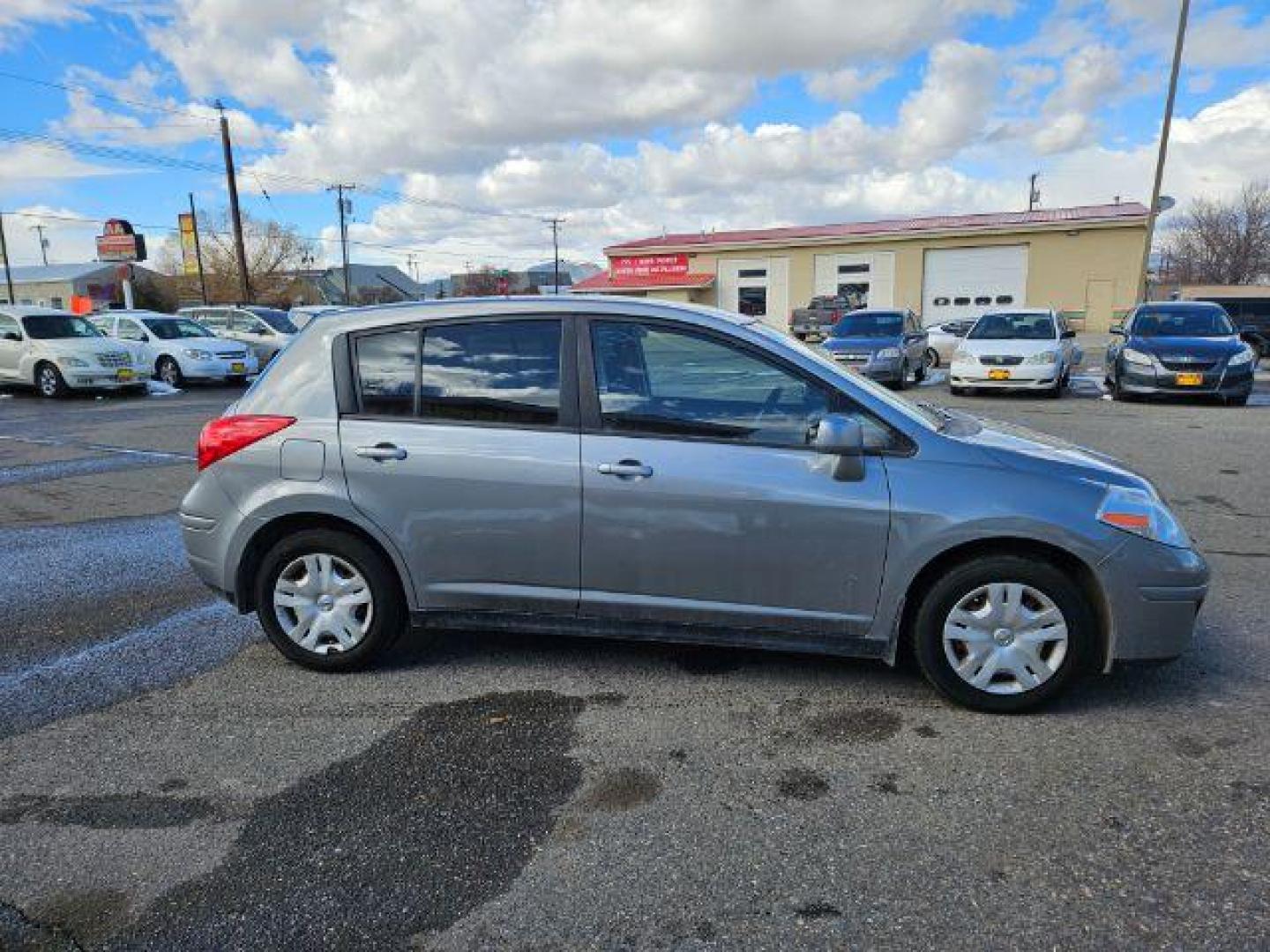 2012 Nissan Versa 1.8 SL Hatchback (3N1BC1CP3CK) with an 1.8L L4 DOHC 16V engine, Continuously Variable Transmission transmission, located at 1821 N Montana Ave., Helena, MT, 59601, 46.603447, -112.022781 - Photo#2