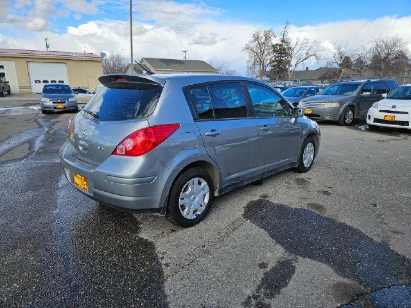 2012 Nissan Versa 1.8 SL Hatchback (3N1BC1CP3CK) with an 1.8L L4 DOHC 16V engine, Continuously Variable Transmission transmission, located at 1821 N Montana Ave., Helena, MT, 59601, 46.603447, -112.022781 - Photo#3