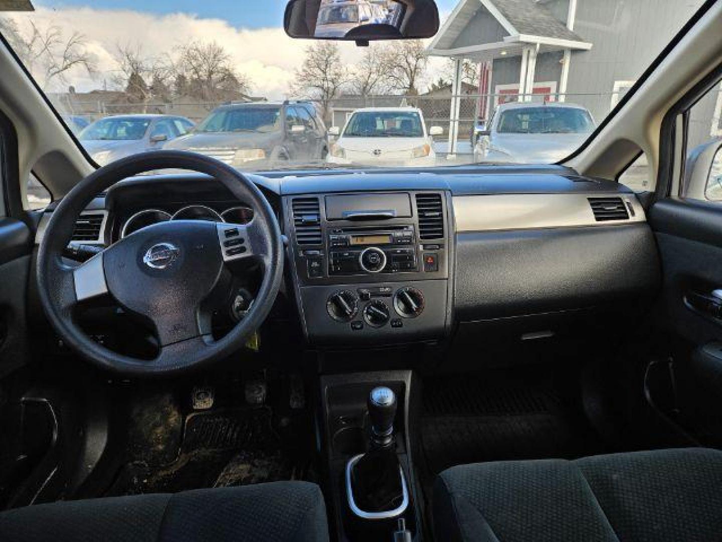 2012 Nissan Versa 1.8 SL Hatchback (3N1BC1CP3CK) with an 1.8L L4 DOHC 16V engine, Continuously Variable Transmission transmission, located at 1821 N Montana Ave., Helena, MT, 59601, 46.603447, -112.022781 - Photo#5