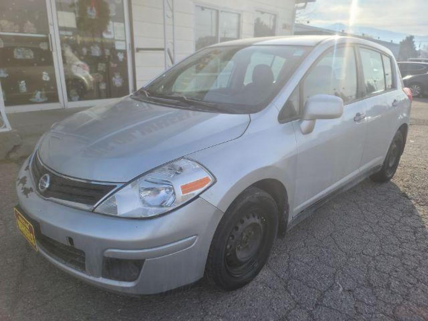 2012 Nissan Versa 1.8 SL Hatchback (3N1BC1CP8CL) with an 1.8L L4 DOHC 16V engine, Continuously Variable Transmission transmission, located at 1800 West Broadway, Missoula, 59808, (406) 543-1986, 46.881348, -114.023628 - Photo#0