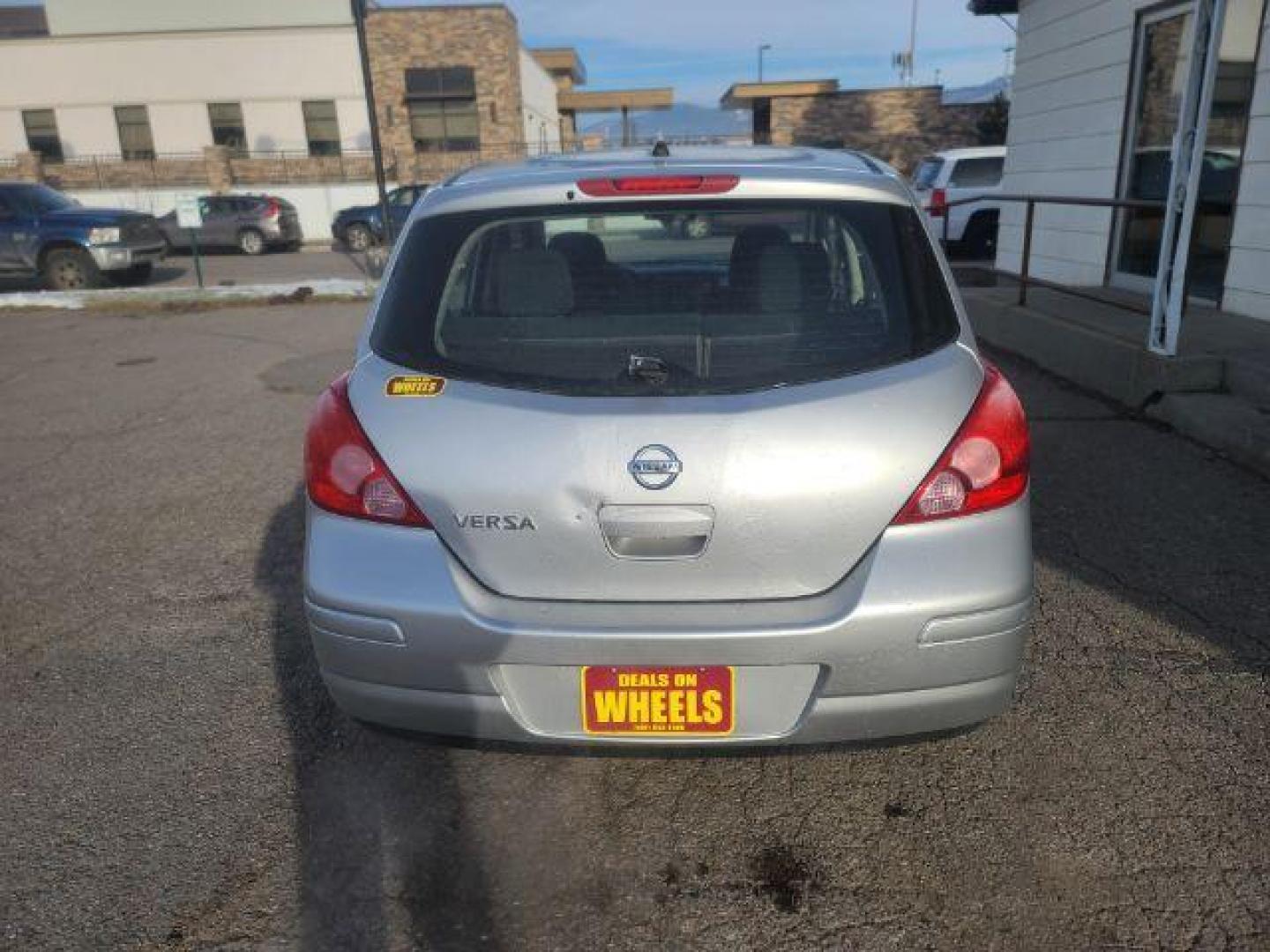 2012 Nissan Versa 1.8 SL Hatchback (3N1BC1CP8CL) with an 1.8L L4 DOHC 16V engine, Continuously Variable Transmission transmission, located at 1800 West Broadway, Missoula, 59808, (406) 543-1986, 46.881348, -114.023628 - Photo#4