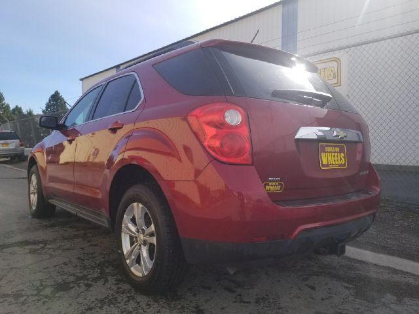 2013 Crystal Red Tintcoat Chevrolet Equinox 2LT AWD (2GNFLNEK6D6) with an 2.4L L4 DOHC 16V engine, 6-Speed Automatic transmission, located at 1800 West Broadway, Missoula, 59808, (406) 543-1986, 46.881348, -114.023628 - Photo#5