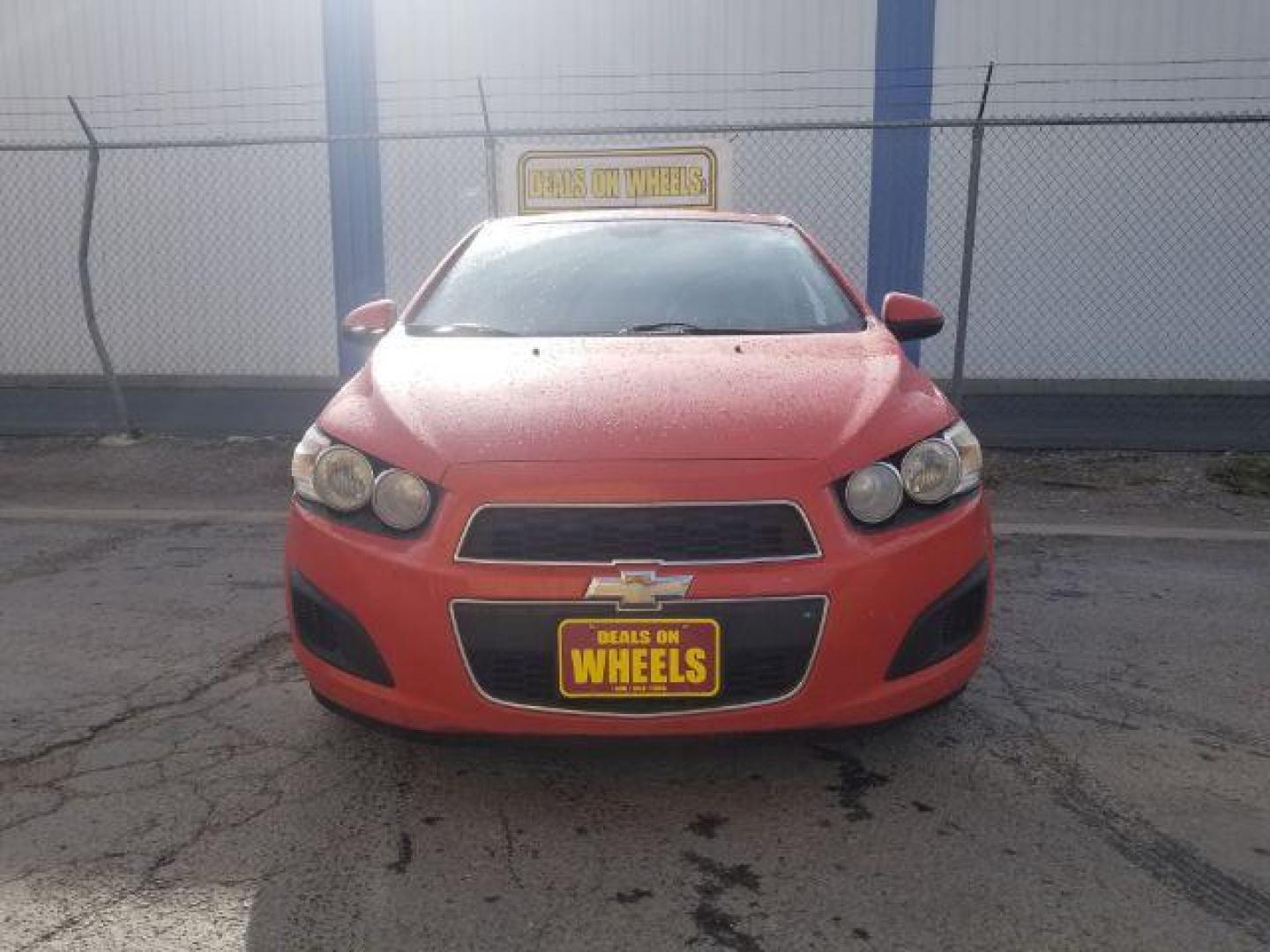 2013 Chevrolet Sonic LT Auto 5-Door (1G1JC6SG0D4) with an 1.8L L4 DOHC 24V engine, 6-Speed Automatic transmission, located at 4047 Montana Ave., Billings, MT, 59101, 45.770847, -108.529800 - Photo#1