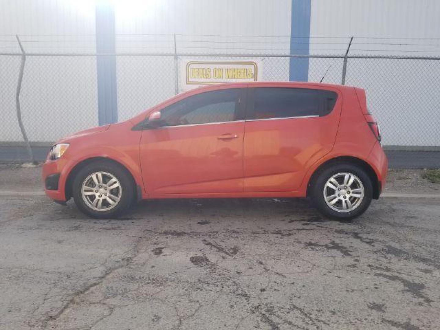 2013 Chevrolet Sonic LT Auto 5-Door (1G1JC6SG0D4) with an 1.8L L4 DOHC 24V engine, 6-Speed Automatic transmission, located at 4047 Montana Ave., Billings, MT, 59101, 45.770847, -108.529800 - Photo#6