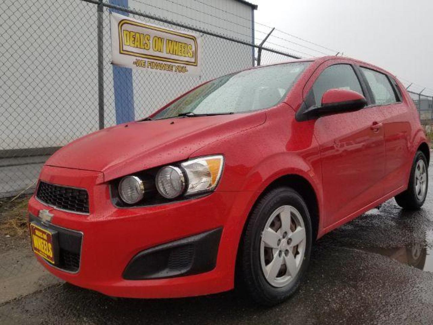 2013 Chevrolet Sonic LS Auto 5-Door (1G1JA6SH6D4) with an 1.8L L4 DOHC 24V engine, 6-Speed Automatic transmission, located at 4047 Montana Ave., Billings, MT, 59101, 45.770847, -108.529800 - Photo#0