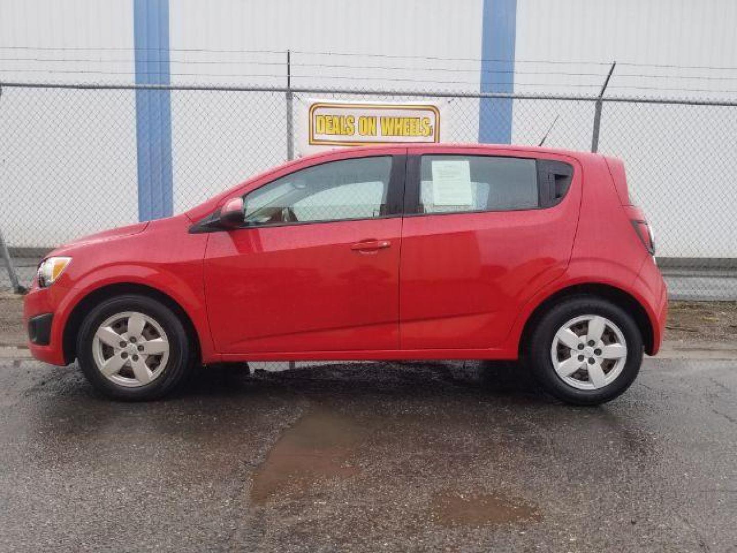 2013 Chevrolet Sonic LS Auto 5-Door (1G1JA6SH6D4) with an 1.8L L4 DOHC 24V engine, 6-Speed Automatic transmission, located at 4047 Montana Ave., Billings, MT, 59101, 45.770847, -108.529800 - Photo#6