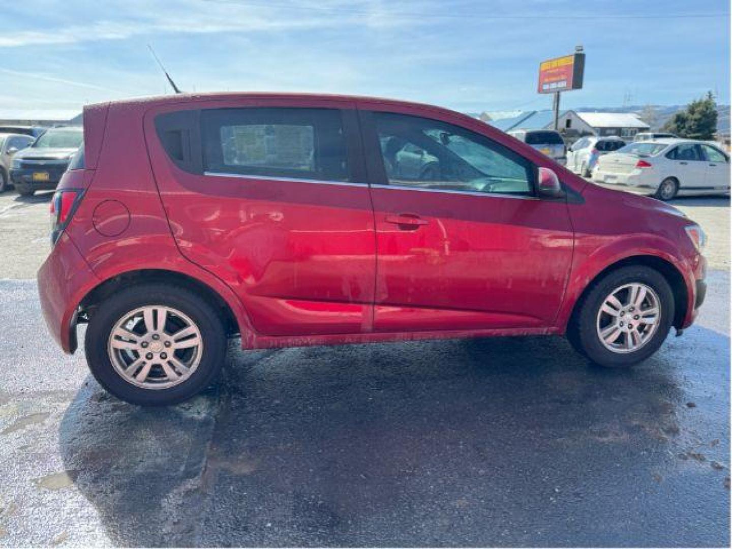 2013 Chevrolet Sonic LT Auto 5-Door (1G1JC6SB7D4) with an 1.4L L4 DOHC 24V TURBO engine, 6-Speed Automatic transmission, located at 601 E. Idaho St., Kalispell, MT, 59901, 48.203983, -114.308662 - Photo#3