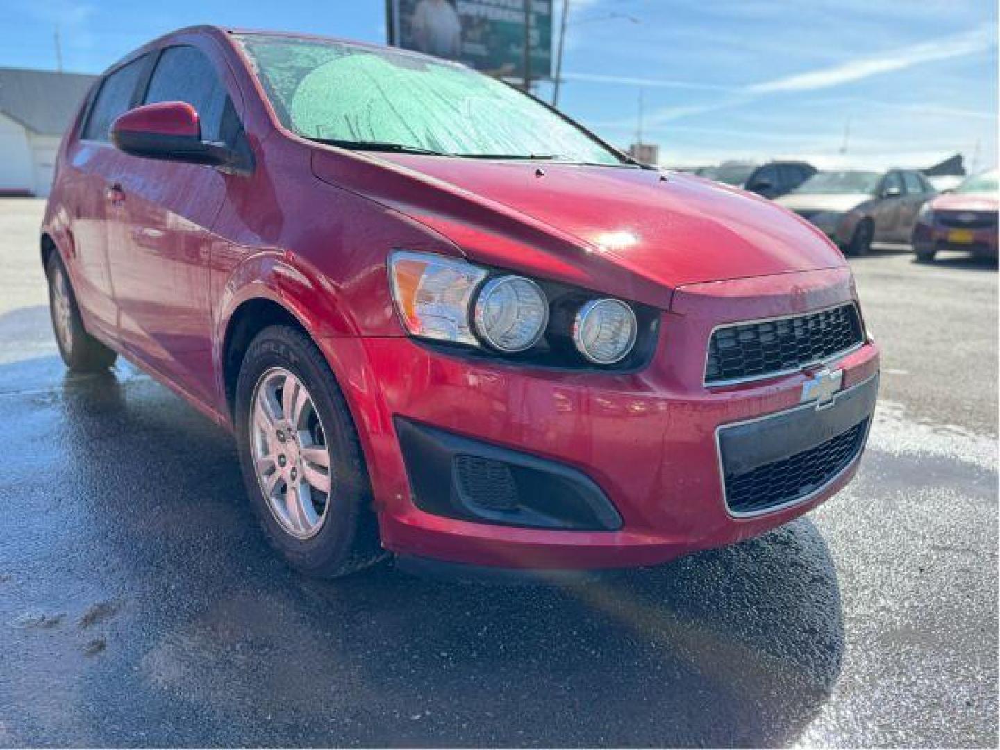 2013 Chevrolet Sonic LT Auto 5-Door (1G1JC6SB7D4) with an 1.4L L4 DOHC 24V TURBO engine, 6-Speed Automatic transmission, located at 601 E. Idaho St., Kalispell, MT, 59901, 48.203983, -114.308662 - Photo#5