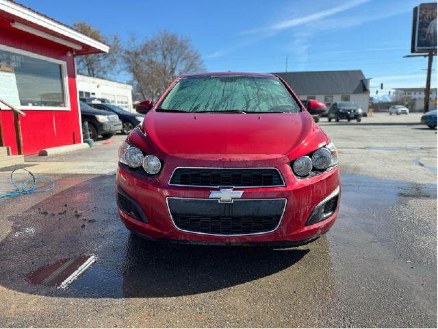 2013 Chevrolet Sonic LT Auto 5-Door (1G1JC6SB7D4) with an 1.4L L4 DOHC 24V TURBO engine, 6-Speed Automatic transmission, located at 601 E. Idaho St., Kalispell, MT, 59901, 48.203983, -114.308662 - Photo#6