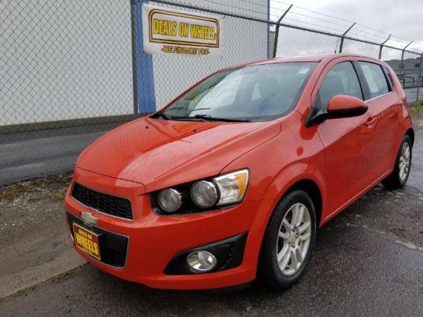 2013 Chevrolet Sonic LT Auto 5-Door (1G1JC6SH9D4) with an 1.8L L4 DOHC 24V engine, 6-Speed Automatic transmission, located at 601 E. Idaho St., Kalispell, MT, 59901, 48.203983, -114.308662 - Photo#0