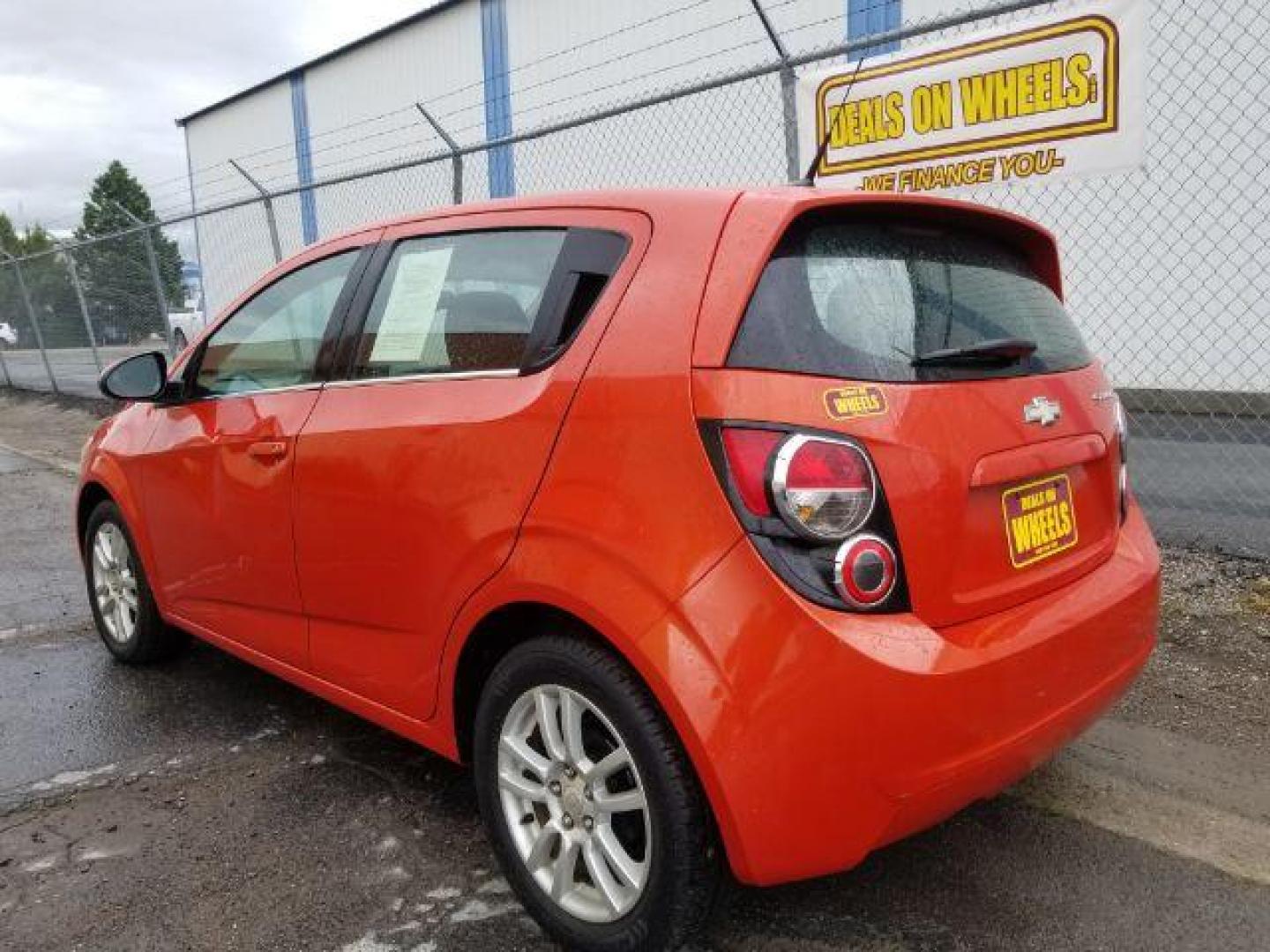 2013 Chevrolet Sonic LT Auto 5-Door (1G1JC6SH9D4) with an 1.8L L4 DOHC 24V engine, 6-Speed Automatic transmission, located at 601 E. Idaho St., Kalispell, MT, 59901, 48.203983, -114.308662 - Photo#3