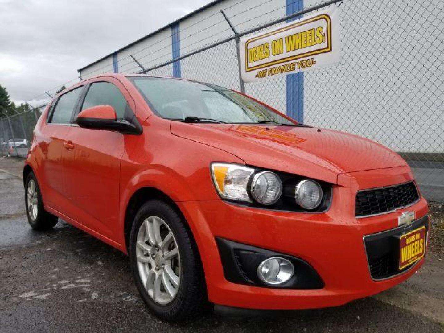 2013 Chevrolet Sonic LT Auto 5-Door (1G1JC6SH9D4) with an 1.8L L4 DOHC 24V engine, 6-Speed Automatic transmission, located at 601 E. Idaho St., Kalispell, MT, 59901, 48.203983, -114.308662 - Photo#6