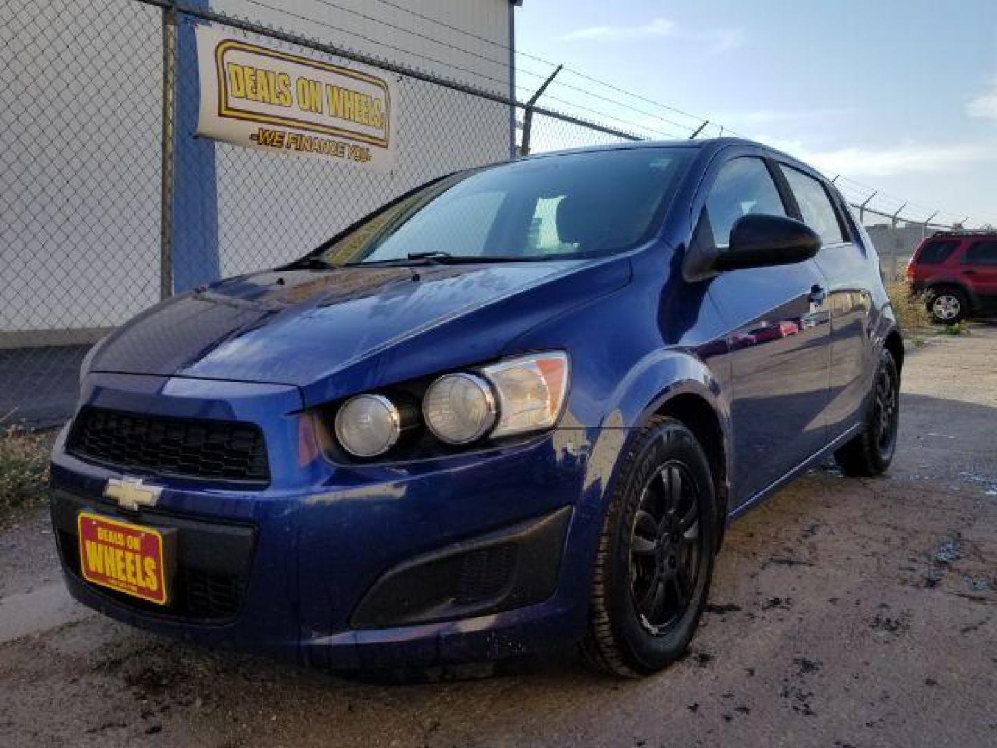 2013 Chevrolet Sonic LT Manual 5-Door (1G1JD6SB8D4) with an 1.4L L4 DOHC 24V TUR engine, 5-Speed Manual transmission, located at 1800 West Broadway, Missoula, 59808, (406) 543-1986, 46.881348, -114.023628 - Photo#0