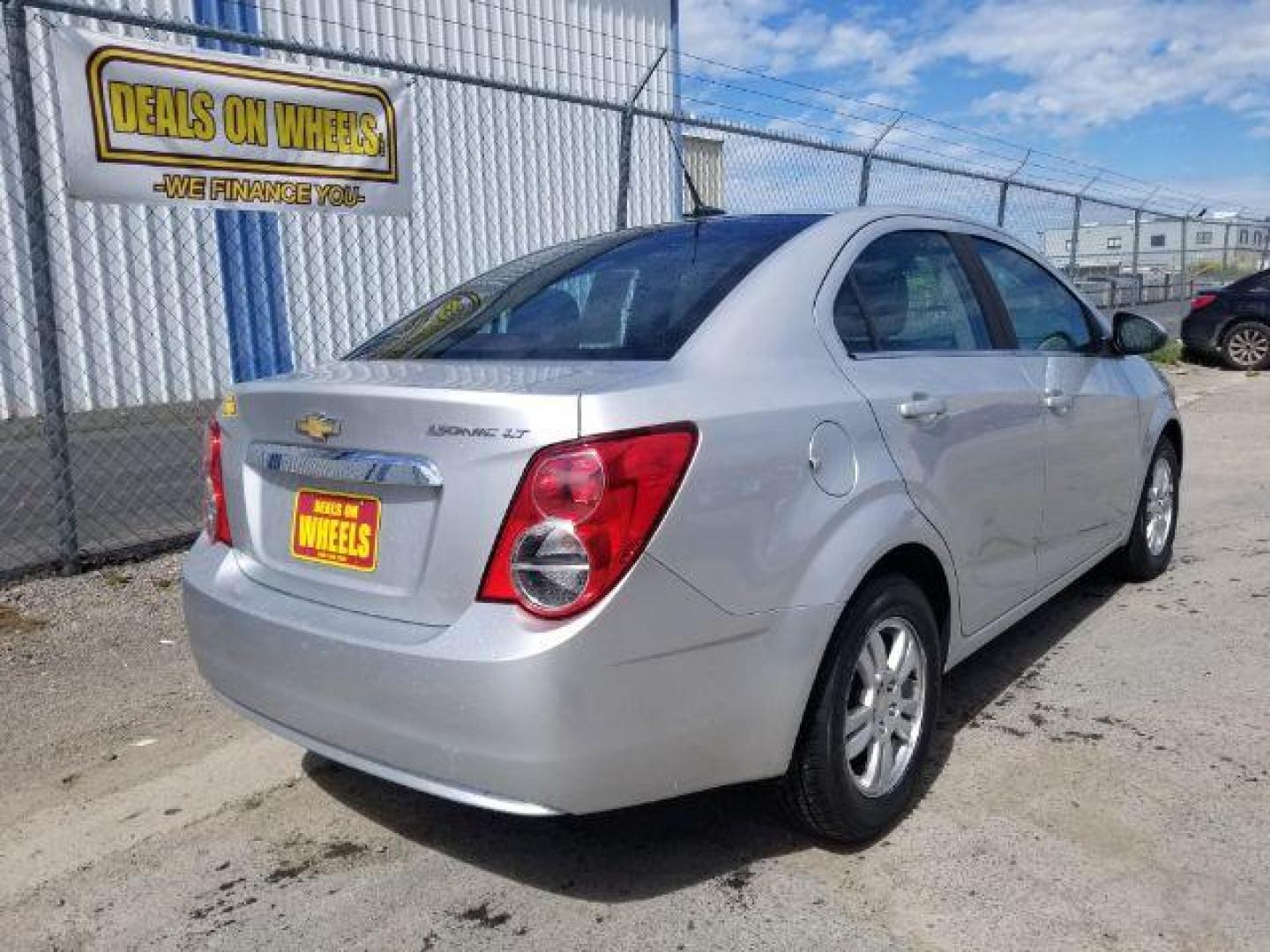 2013 Chevrolet Sonic LT Auto Sedan (1G1JC5SH9D4) with an 1.8L L4 DOHC 24V engine, 6-Speed Automatic transmission, located at 1800 West Broadway, Missoula, 59808, (406) 543-1986, 46.881348, -114.023628 - Photo#4