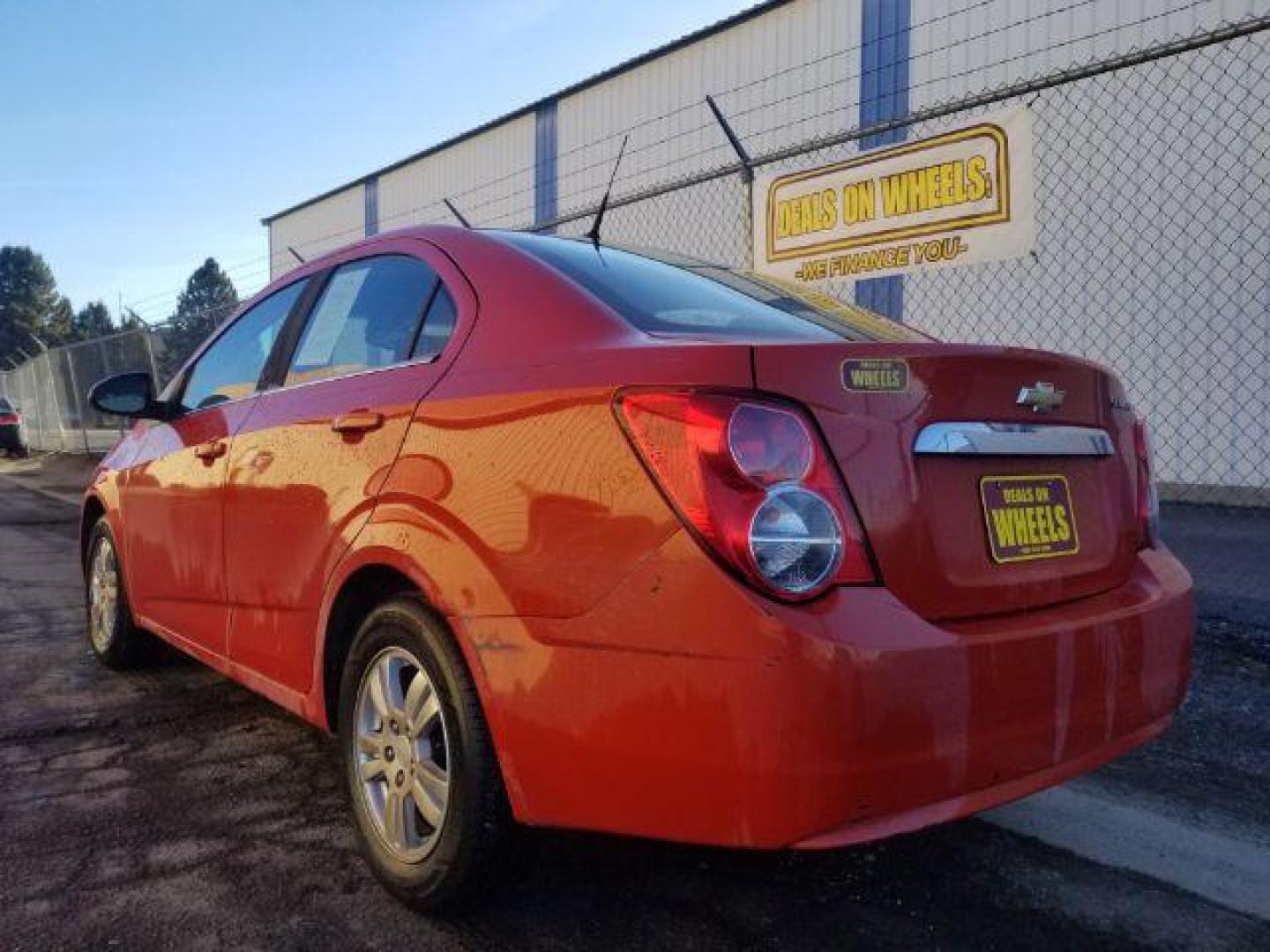 2013 Chevrolet Sonic LT Auto Sedan (1G1JC5SH5D4) with an 1.8L L4 DOHC 24V engine, 6-Speed Automatic transmission, located at 1800 West Broadway, Missoula, 59808, (406) 543-1986, 46.881348, -114.023628 - Photo#5