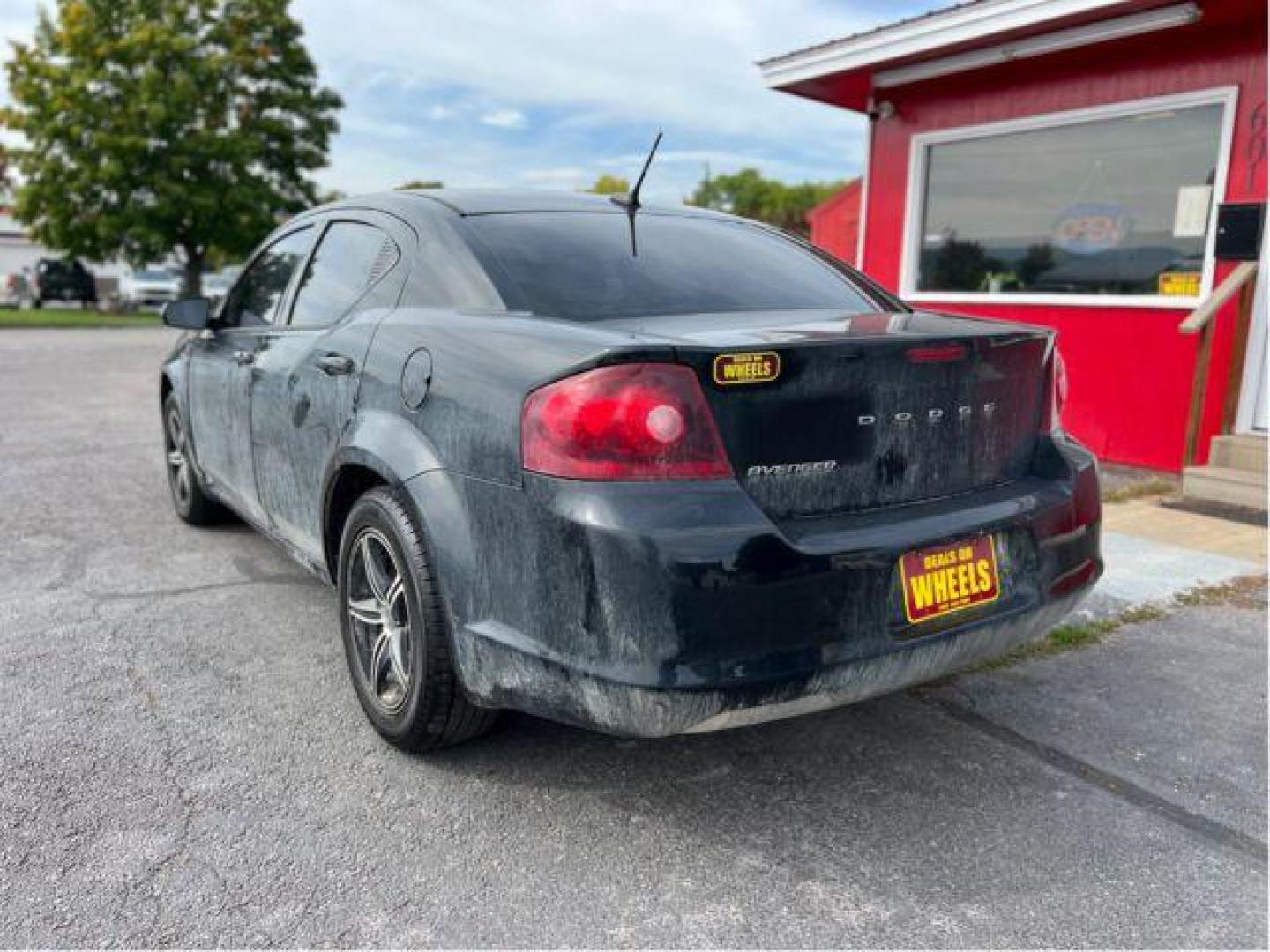 2013 Dodge Avenger Base (1C3CDZAB3DN) with an 2.4L L4 DOHC 16V engine, 4-Speed Automatic transmission, located at 4047 Montana Ave., Billings, MT, 59101, 45.770847, -108.529800 - Photo#2