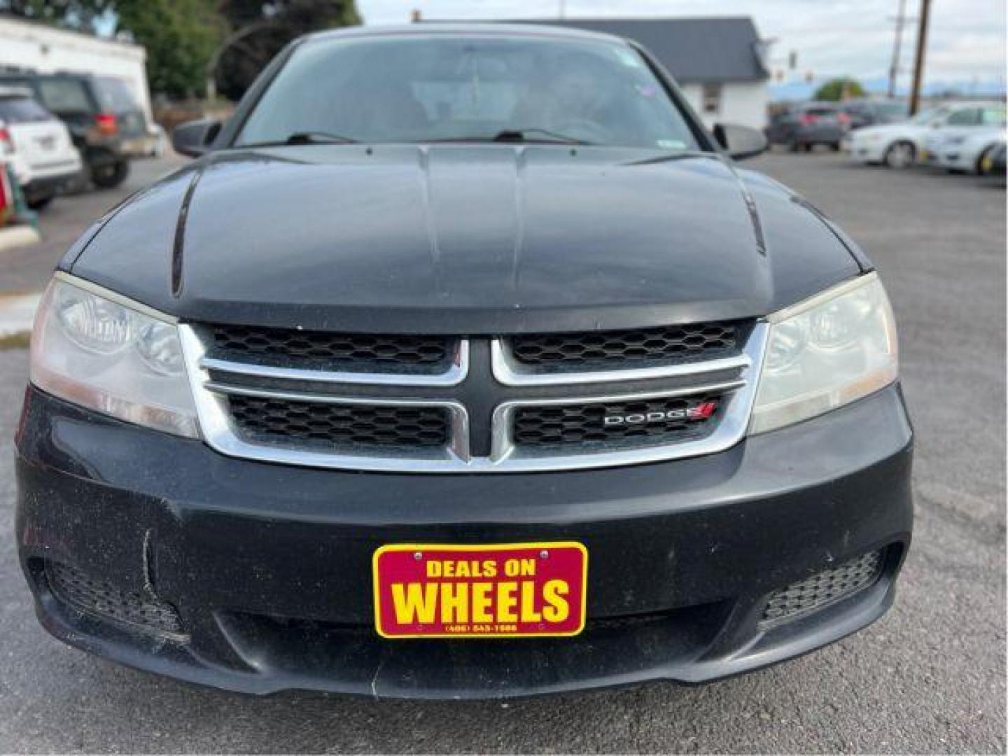 2013 Dodge Avenger Base (1C3CDZAB3DN) with an 2.4L L4 DOHC 16V engine, 4-Speed Automatic transmission, located at 4047 Montana Ave., Billings, MT, 59101, 45.770847, -108.529800 - Photo#7