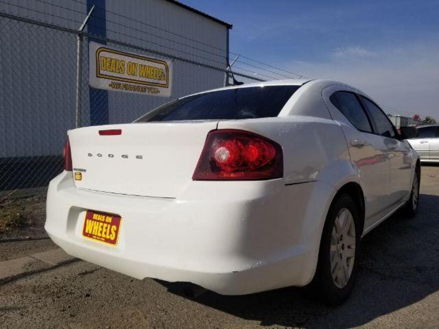 2013 Dodge Avenger Base (1C3CDZAB8DN) with an 2.4L L4 DOHC 16V engine, 4-Speed Automatic transmission, located at 601 E. Idaho St., Kalispell, MT, 59901, 48.203983, -114.308662 - Photo#4